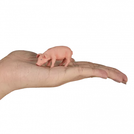Figura decorativa de cerdito comiendo para decoración de estanterías y escritorios.