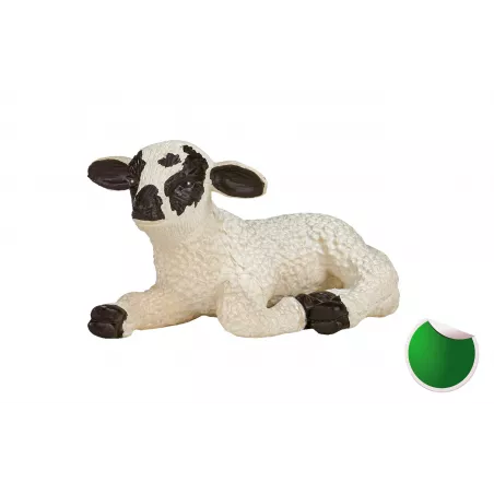 Cordero de cara negra acostado, figura decorativa detallada para belenes y dioramas.
