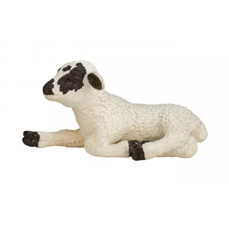 Cordero de cara negra acostado, figura decorativa detallada para belenes y dioramas.