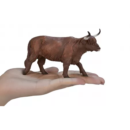 Figura decorativa de vaca Highland de la marca Mojo con detalles realistas para decoración rústica del hogar.