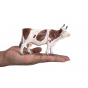 Figura realista de vaca Simmental detallada para coleccionistas y maquetas de granjas.