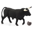 Escultura detallada de toro español, figura decorativa que simboliza fuerza y tradición.