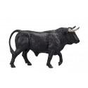 Escultura detallada de toro español, figura decorativa que simboliza fuerza y tradición.