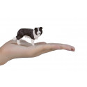 Figura de colección realista de perro Border Collie con acabados detallados.