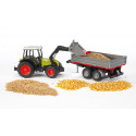 Tractor Claas Nectis 267F con pala y remolque