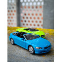 Coche de juguete BMW 645i en miniatura fabricado en metal y plástico con detalles realistas.