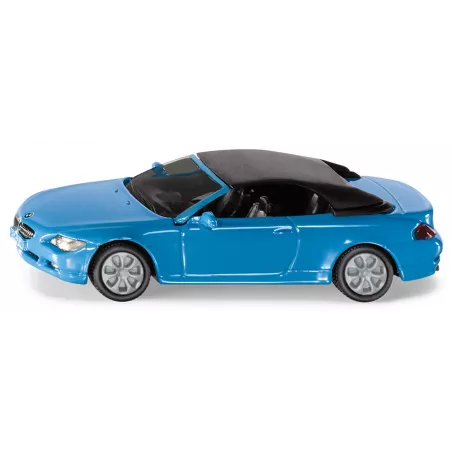 Coche de juguete BMW 645i en miniatura fabricado en metal y plástico con detalles realistas.