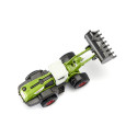 Cargadora de ruedas Claas Torion 1914 de juguete en miniatura de metal y plástico.