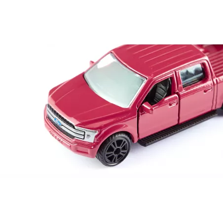 Miniatura de metal Ford F150 con puertas abatibles y enganche de acoplamiento.