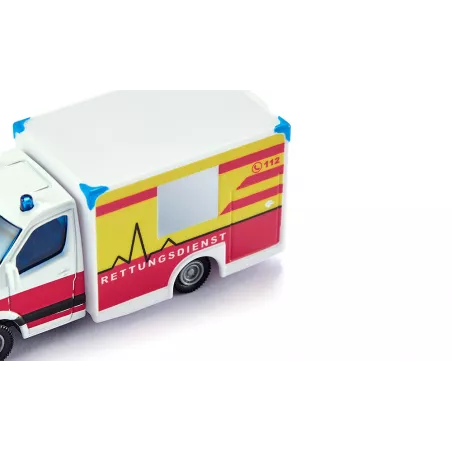 Ambulancia de juguete de metal y plástico con puertas que se abren