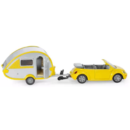 Coche de juguete de metal con caravana acoplada y puertas que se abren