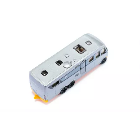 Autobús de juguete de metal y plástico con sistema de acoplamiento y detalles realistas.