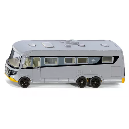 Autobús de juguete de metal y plástico con sistema de acoplamiento y detalles realistas.