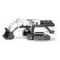 Excavadora de juguete Liebherr R9800 de metal con pala y brazo móviles y chasis de orugas.