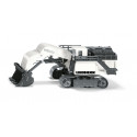 Excavadora de juguete Liebherr R9800 de metal con pala y brazo móviles y chasis de orugas.