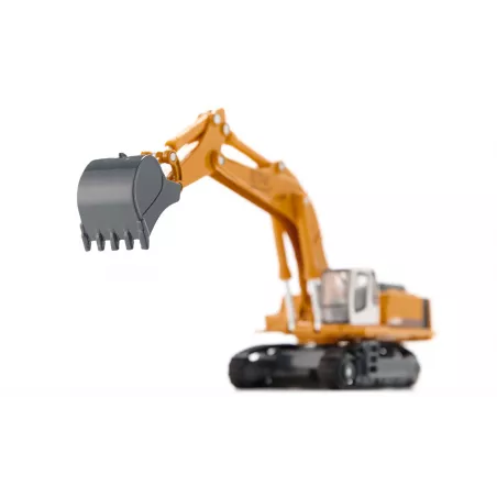 Excavadora de juguete Liebherr a escala 1:87 con chasis de orugas, pala y brazo móvil de metal y plástico.