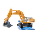 Excavadora de juguete Liebherr a escala 1:87 con chasis de orugas, pala y brazo móvil de metal y plástico.
