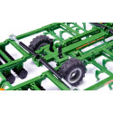 Cultivador de juguete Amazone Centaur de SIKU a escala 1:32 con estructura metálica y rodillos giratorios.