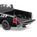 Coche de policía de juguete RAM 1500 a escala 1:50 con puertas que se abren y piezas de metal.