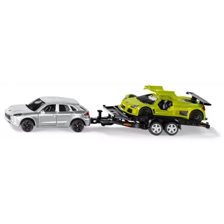 Porsche Cayenne Turbo con remolque de transporte y Porsche GT de juguete Siku 2544 a escala 1:55.