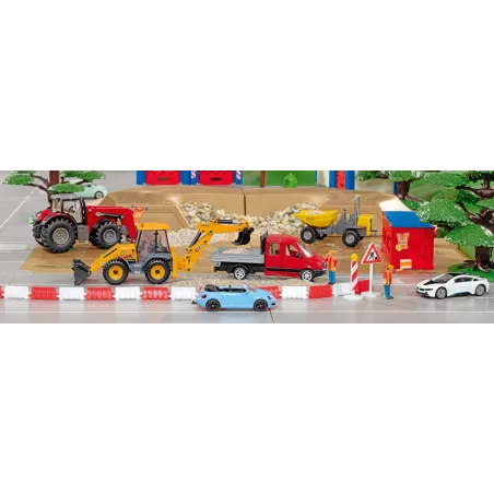 Juguete retroexcavadora JCB 4CX a escala 1:50 con pala y brazo móvil de metal y plástico.