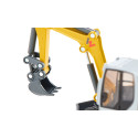 Excavadora de orugas de juguete Wacker Neuson ET65 a escala 1:50 con brazo móvil y pala funcional.