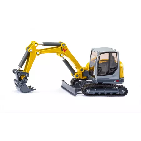 Excavadora de orugas de juguete Wacker Neuson ET65 a escala 1:50 con brazo móvil y pala funcional.