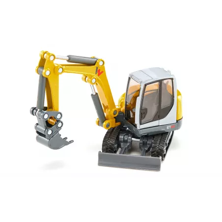 Excavadora de orugas de juguete Wacker Neuson ET65 a escala 1:50 con brazo móvil y pala funcional.