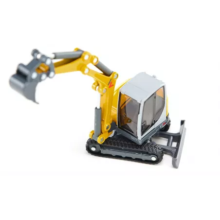 Excavadora de orugas de juguete Wacker Neuson ET65 a escala 1:50 con brazo móvil y pala funcional.