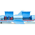 Avión de pasajeros de juguete Siku de metal con accesorios de pista y remolcador.