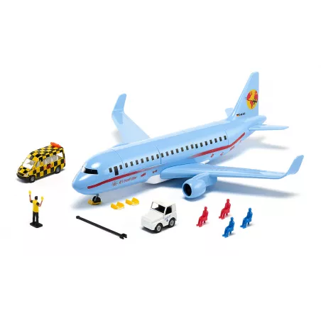Avión de pasajeros de juguete Siku de metal con accesorios de pista y remolcador.
