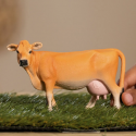 Figura detallada de vaca Jersey de juguete Schleich con pelaje cobrizo