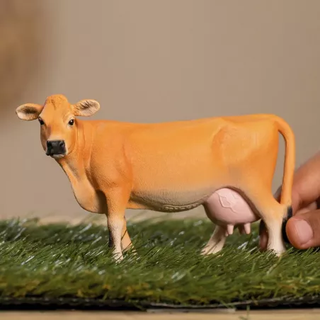 Figura detallada de vaca Jersey de juguete Schleich con pelaje cobrizo