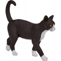 Figura decorativa de gato blanco y negro con diseño realista para estantería o escritorio.