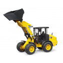 Cargadora de ruedas articulada compacta Cat de juguete Bruder a escala 1:16 con pala frontal.