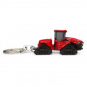 Réplica detallada a escala del tractor Case IH Quadtrac 715 para coleccionistas.