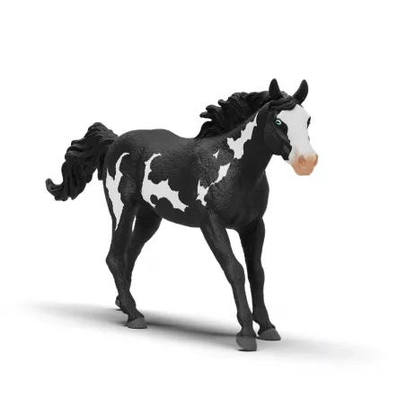 Figura detallada de caballo capón Paint Horse de Schleich pintada a mano con manchas realistas.
