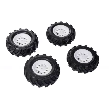 Set de cuatro neumáticos de aire rollyTrac para tractores de pedales infantiles que mejoran la tracción.