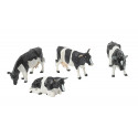 Vacas frisonas de juguete a escala 1:32 de Britains para maquetas de granjas y dioramas coleccionables.