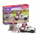 Veterinaria móvil con remolque de Schleich, potro de juguete y accesorios de rescate y cuidado médico.