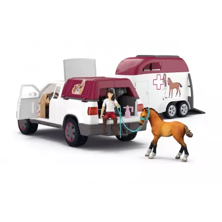 Veterinaria móvil con remolque de Schleich, potro de juguete y accesorios de rescate y cuidado médico.