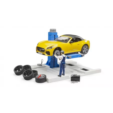 Taller mecánico de juguete bworld de Bruder con coche descapotable y plataforma elevadora a escala 1:16.