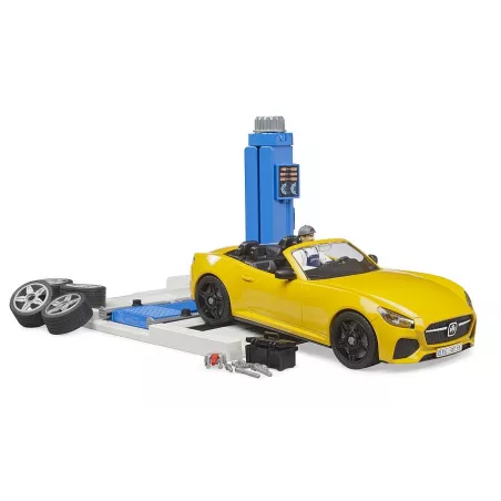 Taller de juguetes bworld Bruder con coche descapotable y plataforma elevadora a escala 1:16