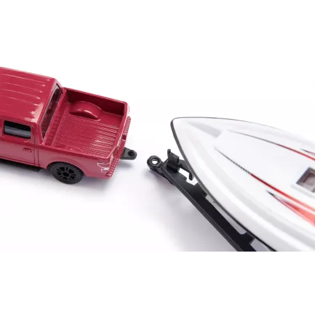 Ford F150 de juguete a escala 1:50 con remolque y lancha motora que flota en el agua.