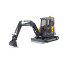 Excavadora compacta de juguete Volvo ECR40 de Bruder con brazo articulado y cabina giratoria.