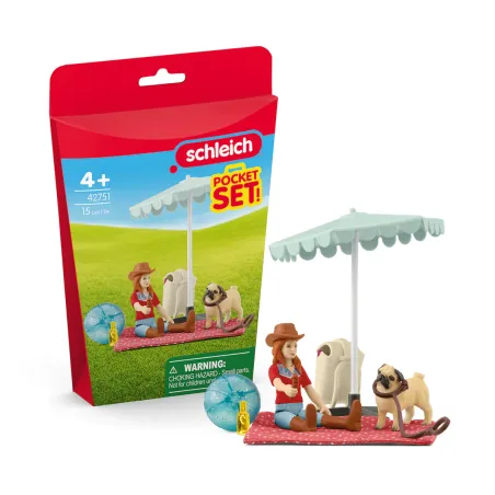 Set de juguete Excursión al Lago de Schleich con Hannah, perro carlino y accesorios de picnic.