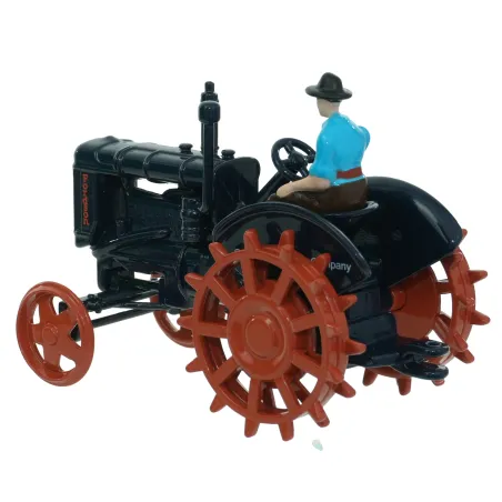 Miniatura a escala 1:32 del tractor clásico Fordson Major con ruedas de hierro de la marca Britains.