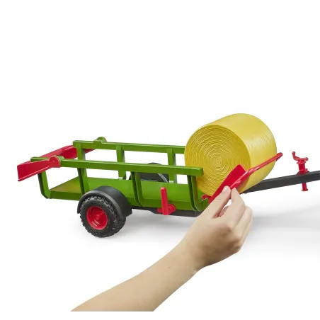Recolector de pacas Bruder escala 1:16 con tres pacas redondas de juguete
