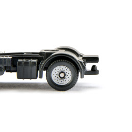 Camión MAN con retroexcavadora