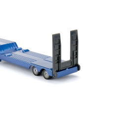 Camión MAN con retroexcavadora